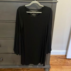 Black bell sleeved dress with a criss cross back!